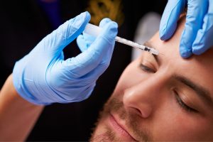 A man getting a Botox injection 